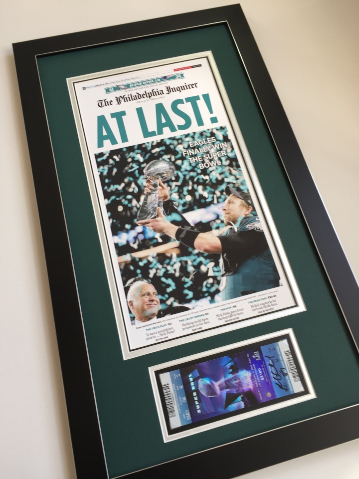 Framed Eagles Newspaper cover and ticket.